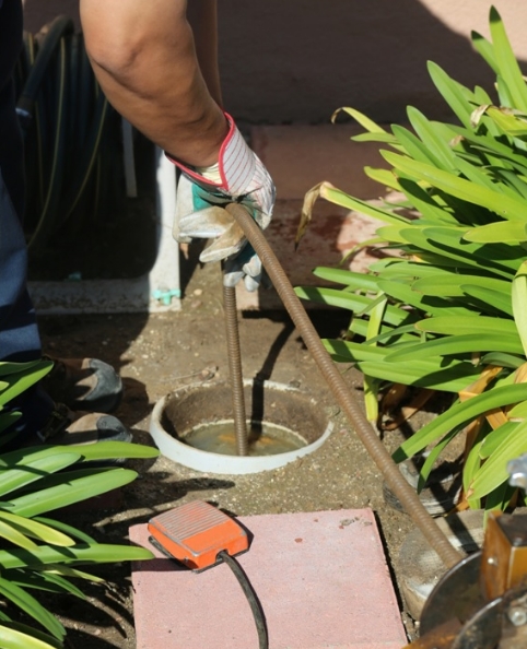 Professional technician working outdoors